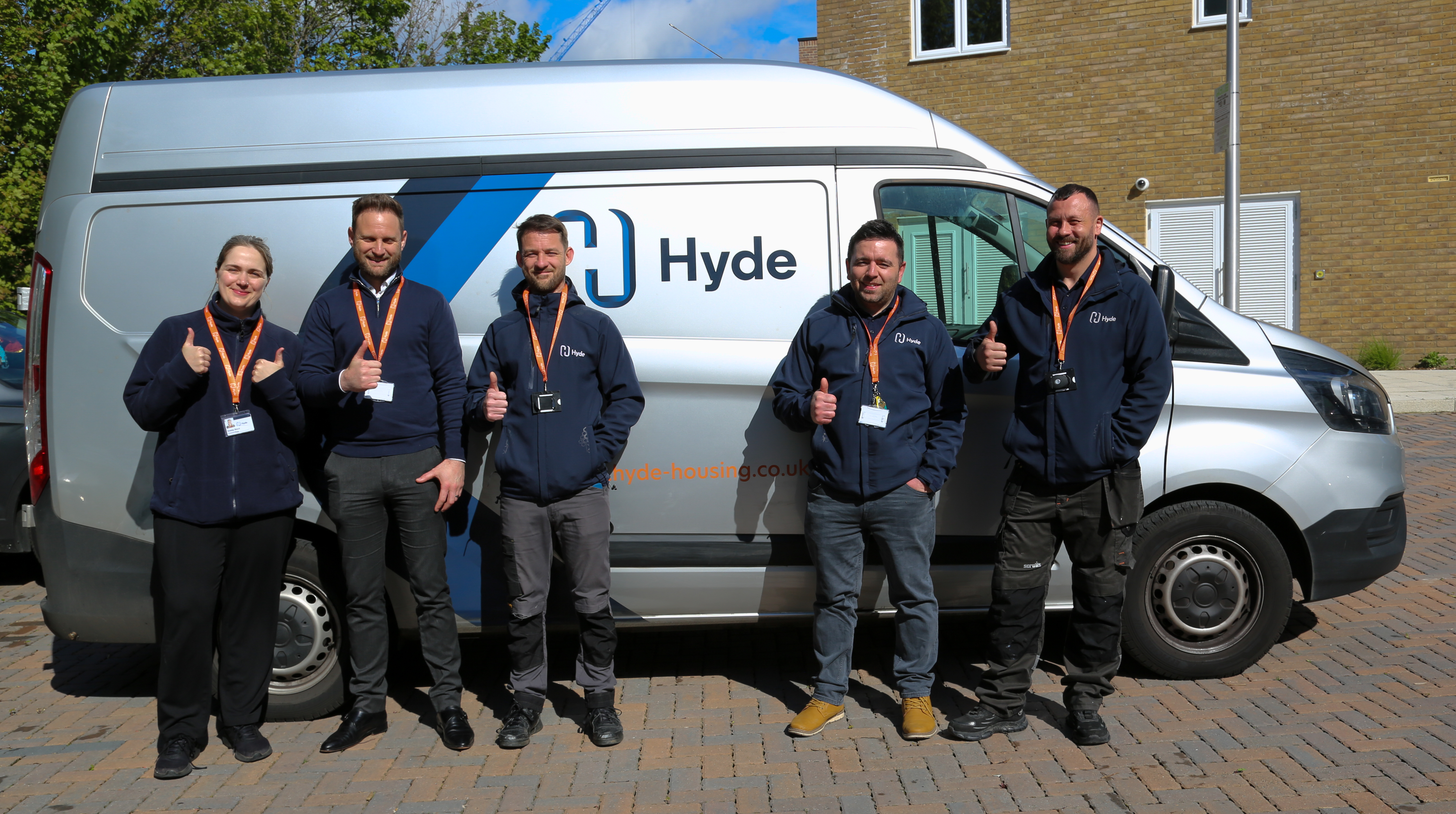 Repairs Team In Front Of Van