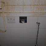 neglected and damaged electrical plug socket
