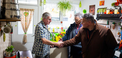 Neal Shaking Hands